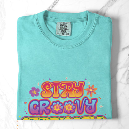 Stay Groovy Capricorn – Retro Flower Power Zodiac Tee