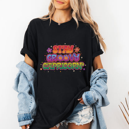 Stay Groovy Capricorn – Retro Flower Power Zodiac Tee