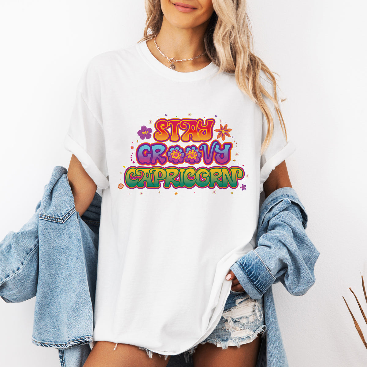 Stay Groovy Capricorn – Retro Flower Power Zodiac Tee
