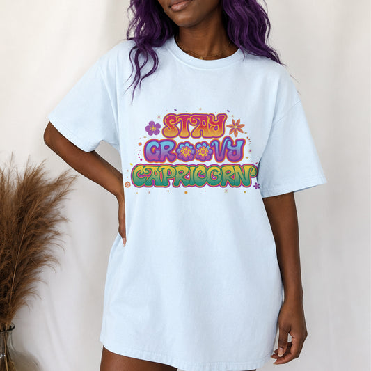 Stay Groovy Capricorn – Retro Flower Power Zodiac Tee